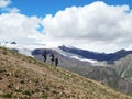 Travellers on Mount Cheget in Elbrus region