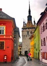 Travellers in Sighisoara - Couple walking in medieval town. Rainny days