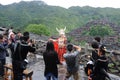 Travellers take pictures in Chinese miao village