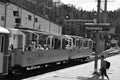 Travellers and tourists in the cabrio train at the station in Pontresina in the upper Engadin