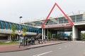 Travellers are waiting at bus stop near a Dutch railway station