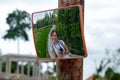 Travelling in Bali rice terrace. Caucasian woman smile in road mirror Royalty Free Stock Photo