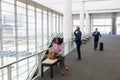 Travelling business people in modern corridor Royalty Free Stock Photo