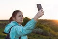 Travelling hiking backpacking sunset selfie sell phone