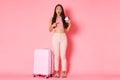 Travelling, holidays and vacation concept. Full-length of surprised and amazed girl tourist standing near suitcase Royalty Free Stock Photo