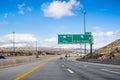 Travelling on the interstate towards Reno; the city`s downtown visible in the background; Nevada