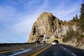 Travelling on the shoreline of Lake Tahoe on a sunny winter day, Cave Rock visible in the background; Nevada Royalty Free Stock Photo