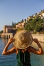 Travelling to Alanya. Backview portait of a young fit female in