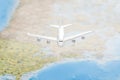 Travelling, tourism, communications and all things related series - plane over world map Royalty Free Stock Photo