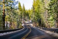 Travelling on a winding road on the shoreline of Lake Tahoe on a winter day Royalty Free Stock Photo