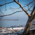 The TravemÃÂ¼nde lighthouse in winter and the sky is cloudless and blue Royalty Free Stock Photo