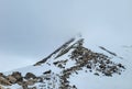 Traversing the last ridge line to the summit Royalty Free Stock Photo