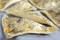 A travy full with ready to be cook Triangular Burekas Royalty Free Stock Photo