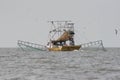 Trawling boat catching shrimp in Vermillion bay in louisiana.