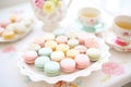 tray of assorted macarons in pastel colors