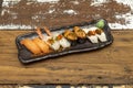 Tray of assorted nigiri and gunkan Norwegian salmon sushi, butterfish nigiri Royalty Free Stock Photo