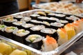 tray of assorted sushi ready for the oven