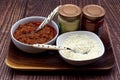 A tray with bolognese ragu and Italian parmigiano reggiano cheese and sauces