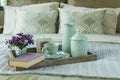 Tray with book,tea set and flower on the bed Royalty Free Stock Photo