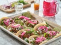 Tray of carne asada tacos topped with pickled onions and cojita cheese Royalty Free Stock Photo