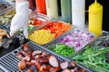 Tray with cooked food on showcase Royalty Free Stock Photo