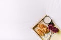 tray with croissants roses bed. High quality photo Royalty Free Stock Photo