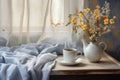 a tray with a cup of coffee and a vase with wildflowers on a bed with pastel linen Royalty Free Stock Photo