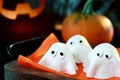 Tray of cute little Halloween monsters or ghosts