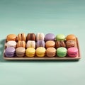 A tray of delicate and colorful macarons, arranged in neat rows on a pastel surface