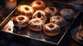 a tray of donuts with white and brown icing