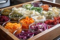 tray of fermented vegetables, ready to be sliced and eaten