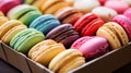 Tray filled with assorted French macarons in vibrant colors Royalty Free Stock Photo
