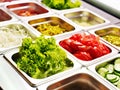 Tray with food on showcase at cafeteria Royalty Free Stock Photo