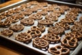 tray of freshly baked brezels, ready to be enjoyed