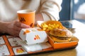 tray full of fast food in Russian McDonalds Restaurant Vkusno I Tochka, Big Mac Menu, chicken nuggets new logo box Royalty Free Stock Photo