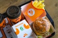 tray full of fast food in Russian McDonalds Restaurant Vkusno I Tochka, Big Mac Menu, chicken nuggets new logo box Royalty Free Stock Photo