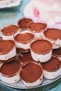 Tray full of individual tiramisu desserts