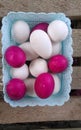 A tray full of red and white eggs Royalty Free Stock Photo