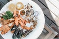 Tray of mussel, shrimp,prawns and clams with spicy and sour dipping sauce that is packed full of Thai seafood flavor. Royalty Free Stock Photo