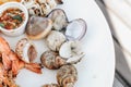 Tray of mussel, shrimp,prawns and clams with spicy and sour dipping sauce that is packed full of Thai seafood flavor. Royalty Free Stock Photo