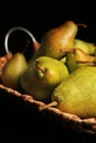 Tray with ripe pears on dark background Royalty Free Stock Photo