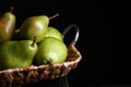 Tray with ripe pears on table against dark background, closeup Royalty Free Stock Photo