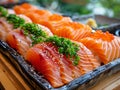 A tray of salmon and other fish on a table Royalty Free Stock Photo
