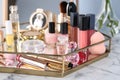 Tray with luxury cosmetics on dressing table