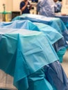 A tray of sterile surgical instruments being checked before an operation. Royalty Free Stock Photo