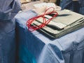 A tray of sterile surgical instruments being checked before an operation. Royalty Free Stock Photo