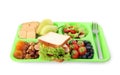 Tray with tasty food on white background. School lunch Royalty Free Stock Photo