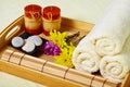 Tray of towels, candles and pebbles - spa Royalty Free Stock Photo