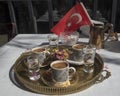 Tray with Turkish coffee and water on a white tablecloth in Istanbul Royalty Free Stock Photo