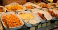 trays full of pasta dishes with gnocchi asparagus pie and other